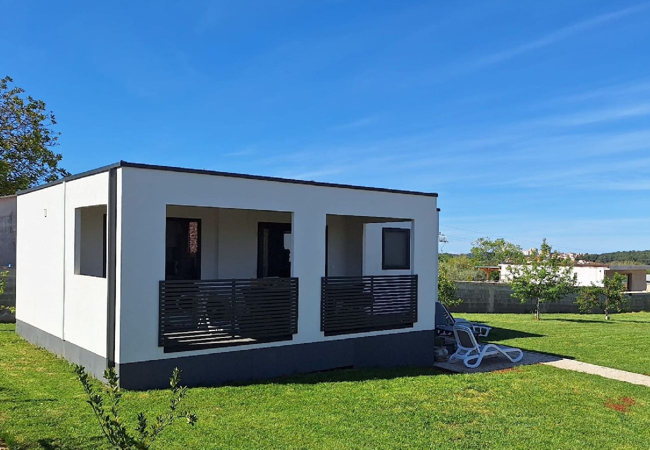 Ferienhaus in Pula - Haus Lucia mit Terrasse und Gartenblick