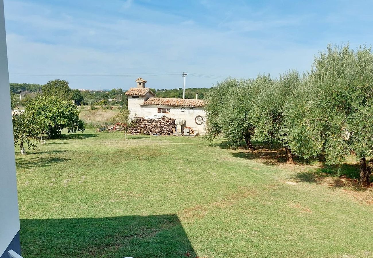 Ferienhaus in Pula - Haus Lucia mit Terrasse und Gartenblick