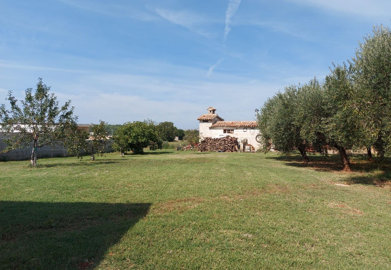 Ferienhaus in Pula - Haus Lucia mit Terrasse und Gartenblick