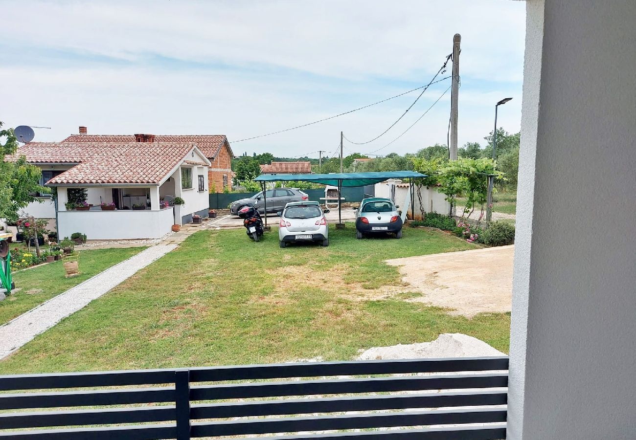 Ferienhaus in Pula - Haus Lucia mit Terrasse und Gartenblick