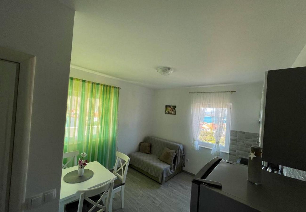 Ferienwohnung in Murter - Apartments Kostelić - Apartment mit einem Schlafzimmer und Meerblick A3