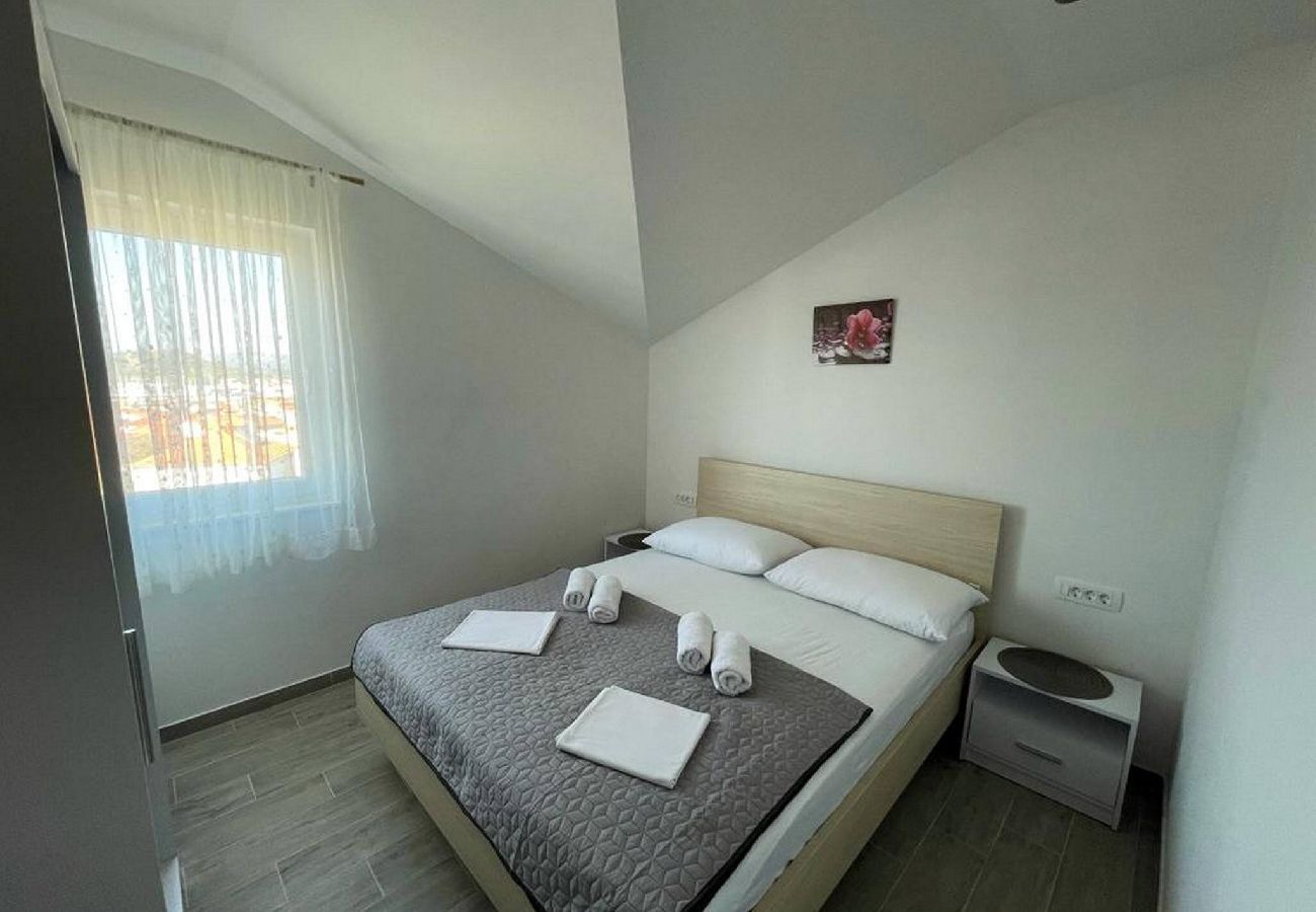 Ferienwohnung in Murter - Apartments Kostelić - Apartment mit einem Schlafzimmer und Meerblick A3